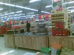 亳州香油磨 郑州家兴石磨供应好的超市柜台香油磨